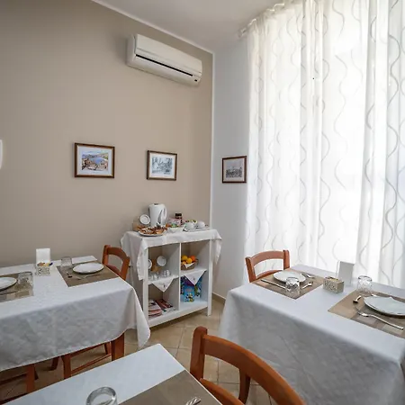 Dionisio Couette-café Taormine